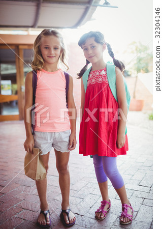 Two cute smilling little girl posing Two cute smilling little girl posing 32304146