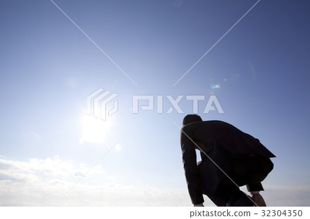 Businessman standing in running businessman Businessman standing in running businessman 32304350