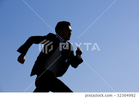 Running businessman 32304992