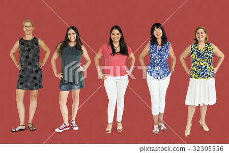 Diverse group of cheerful women standing in a row 32305556