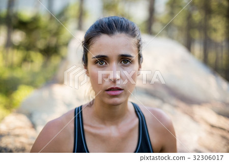 Portrait of woman looking the camera Portrait of woman looking the camera 32306017