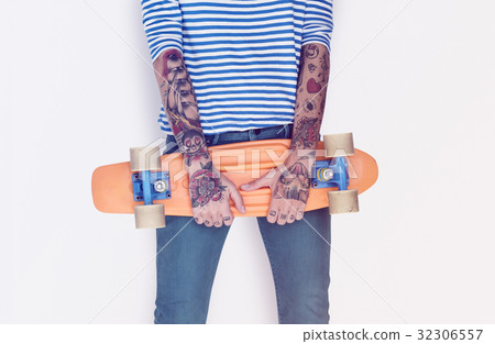 Woman Tattoo Arms Holding Skateboard Studio 32306557