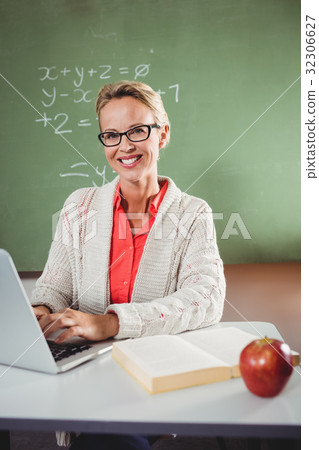 Teacher using a laptop 32306627