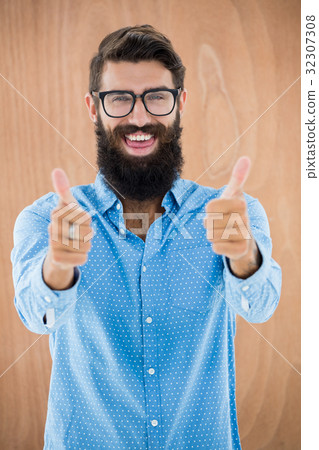 Hipster with thumbs up 32307308