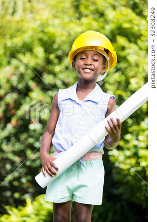 Cute mixed-race girl wearing handyman clothes Cute mixed-race girl wearing handyman clothes 32308249