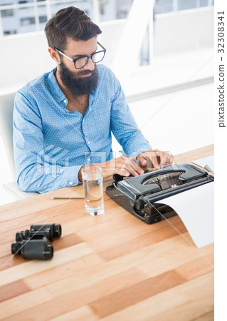 Hipster using type writer 32308341