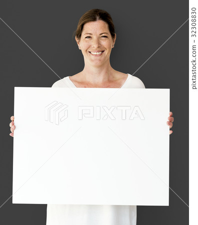 Caucasian Woman is Holding Placard 32308830