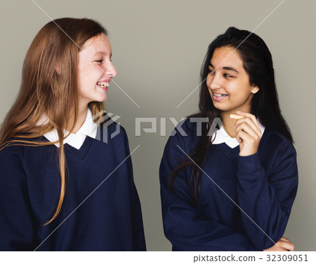 Young girl students smiling studio portrait 32309051