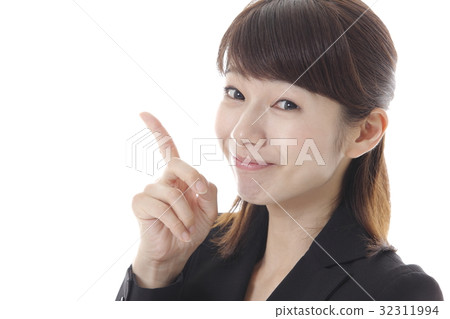 A woman with a pointing pose 32311994