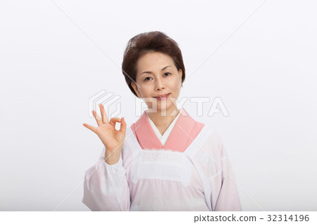 A woman wearing a cup A woman wearing a cup 32314196