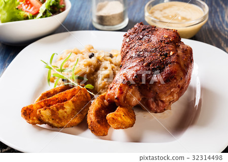 Pork knuckle with fried sauerkraut 32314498