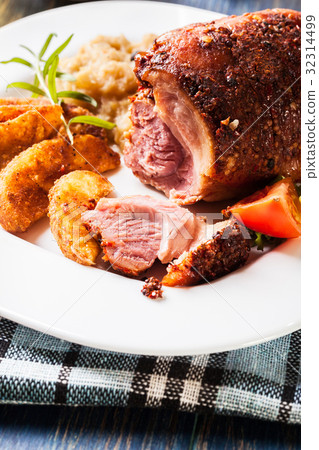 Pork knuckle with fried sauerkraut 32314499