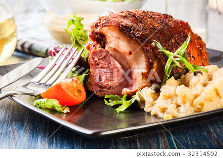 Pork knuckle with fried sauerkraut 32314502