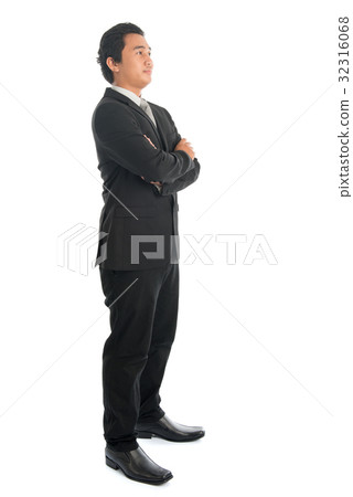 Side view Asian businessman arms folded Side view Asian businessman arms folded 32316068