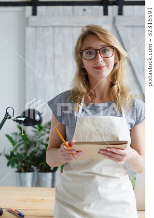 Blonde florist on background flower Blonde florist on background flower 32316591