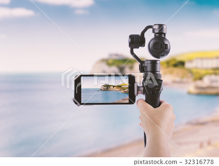 Smartphone shooting Isle of Wight coast Alum Bay  32316778