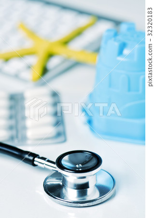 starfish and beach pail on a doctors office 32320183