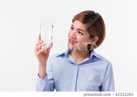 healthy asian woman holding glass of fresh water healthy asian woman holding glass of fresh water 32322265