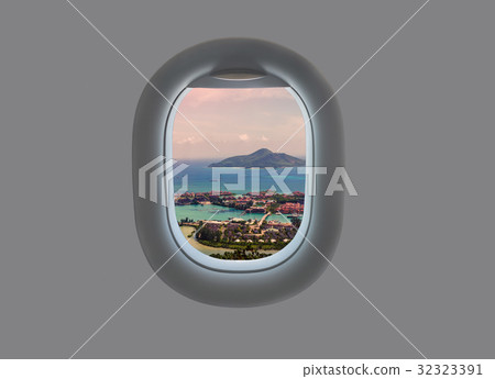 Panorama of the island of Mahe in the plane window Panorama of the island of Mahe in the plane window 32323391