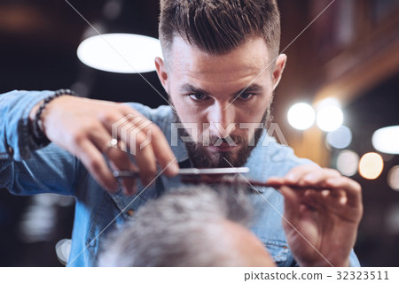 Nice bearded barber doing his job 32323511