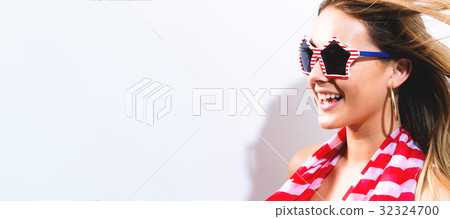 Happy young woman red striped scarf 32324700