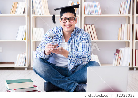 Young student studying with books 32325035