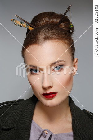 Portrait of model with oriental hairstyle 32325103