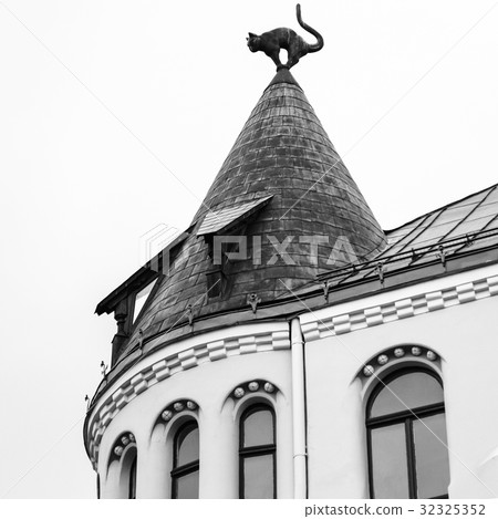 cat figure on turret rooftop of Cat House in Riga 32325352