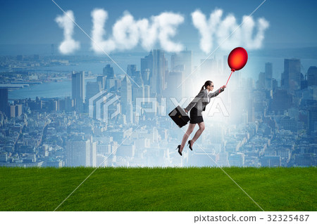 Woman flying balloons in romantic concept Woman flying balloons in romantic concept 32325487