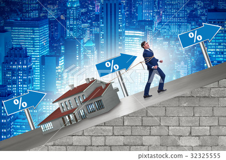 Businessman in mortgage debt financing concept 32325555