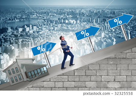 Businessman in mortgage debt financing concept 32325558