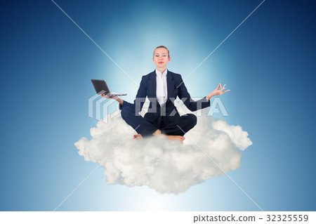 Businesswoman working in the sky and meditating 32325559