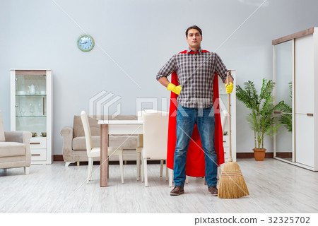 Super hero cleaner working at home 32325702
