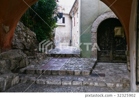 gateway on street in medieval town Eze 32325902