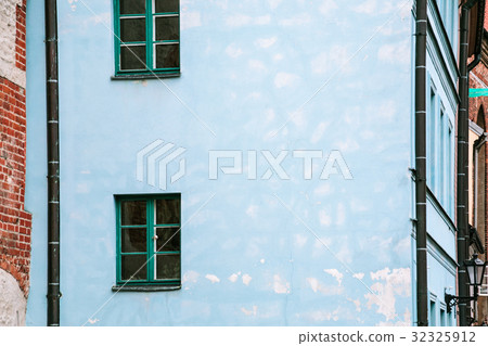 blue facade of old house on street in Riga city blue facade of old house on street in Riga city 32325912