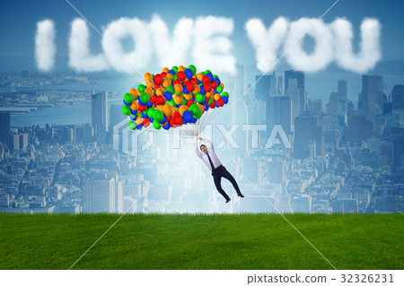 Man flying balloons in romantic concept Man flying balloons in romantic concept 32326231