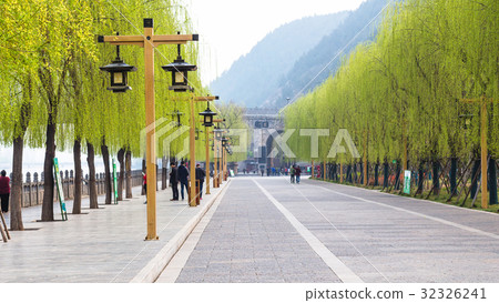 visitors on quay walk to Longmen Grottoes 32326241