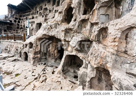 caves and Grottoes in wall of West Hill in Longmen 32326406