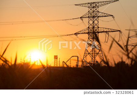 Transmission power line silhouette on sunset 32328061