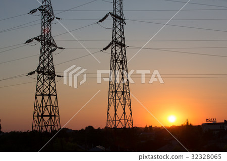 Transmission power line silhouette on sunset 32328065