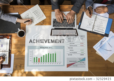 Workers working on laptop network graphic overlay Workers working on laptop network graphic overlay 32329415