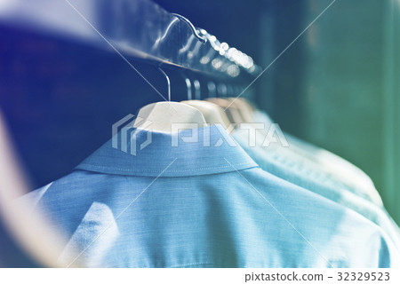 Cloths collection hanging on the rack Cloths collection hanging on the rack 32329523