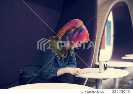 Woman Using Mobile Phone During Office Break Time Social Media Woman Using Mobile Phone During Office Break Time Social Media 32335040