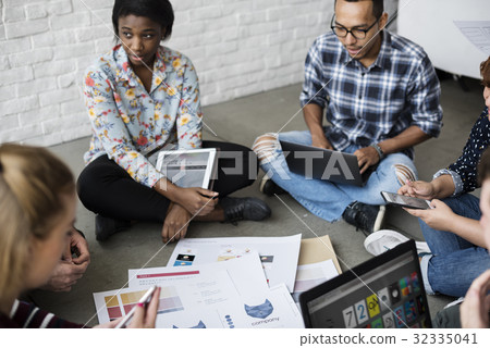 Group of people brainstorming meeting in the room Group of people brainstorming meeting in the room 32335041