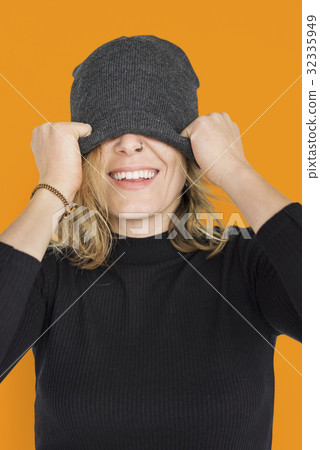 Caucasian Lady Beanie Covering Eyes Smiling 32335949