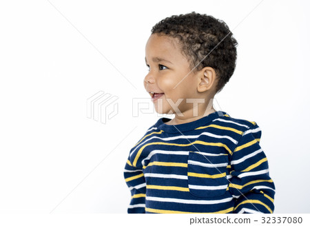 Happiness african little boy smiling casual studio portrait Happiness african little boy smiling casual studio portrait 32337080