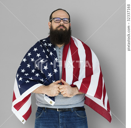 Man holding flag and posing for photoshoot 32337168