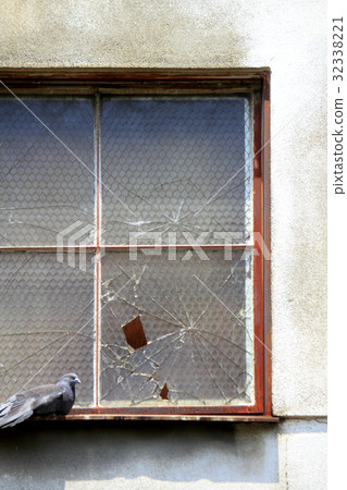 Warehouse broken window glass Warehouse broken window glass 32338221