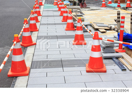 Expansion work on the sidewalk 32338904