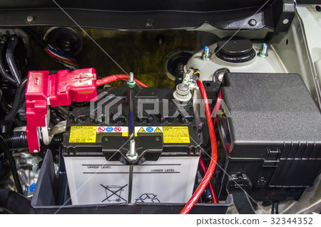 Car battery in engine room with connect cable 32344352